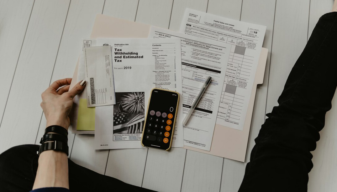 person using financial calculator