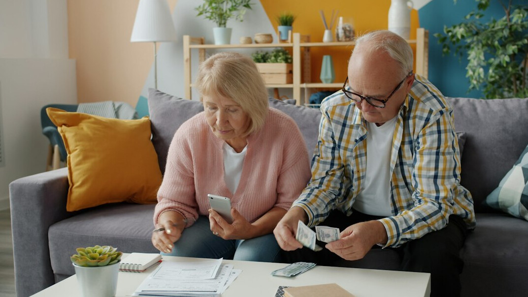 person smiling with financial success